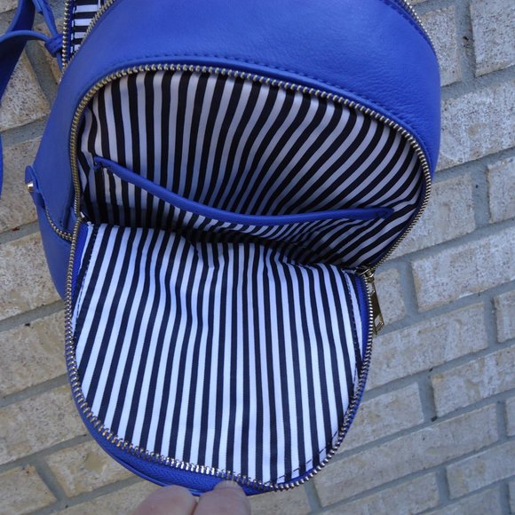 Mini backpack purse with gold tone zippers. main image 4